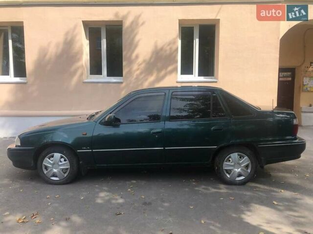 Зеленый Дэу Нексия, объемом двигателя 1.5 л и пробегом 252 тыс. км за 1300 $, фото 2 на Automoto.ua