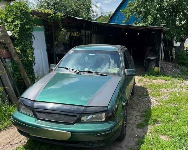 Зелений Деу Нексія, об'ємом двигуна 1.5 л та пробігом 200 тис. км за 2000 $, фото 9 на Automoto.ua