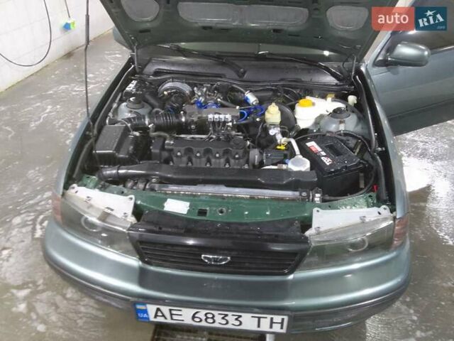 Зелений Деу Нексія, об'ємом двигуна 1.5 л та пробігом 150 тис. км за 3100 $, фото 11 на Automoto.ua