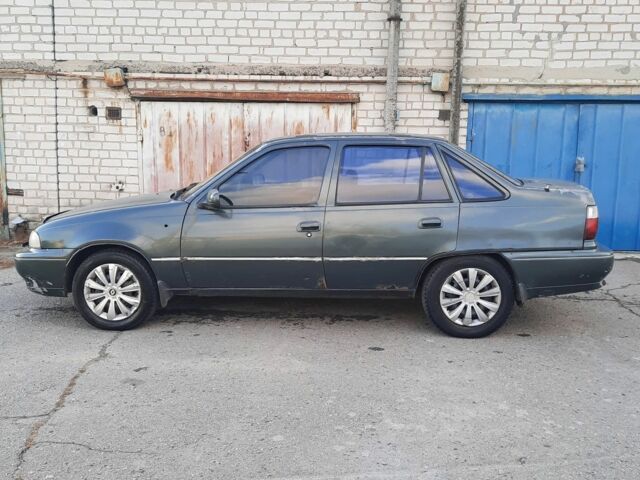 Зелений Деу Нексія, об'ємом двигуна 1.6 л та пробігом 250 тис. км за 650 $, фото 14 на Automoto.ua