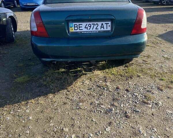 Зелений Деу Нексія, об'ємом двигуна 1.6 л та пробігом 225 тис. км за 1100 $, фото 3 на Automoto.ua