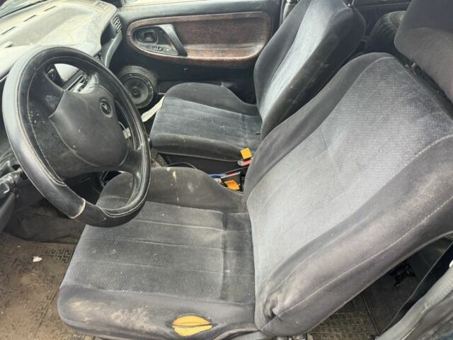 Зелений Деу Нексія, об'ємом двигуна 1.5 л та пробігом 300 тис. км за 450 $, фото 7 на Automoto.ua