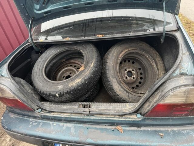 Зелений Деу Нексія, об'ємом двигуна 1.5 л та пробігом 300 тис. км за 450 $, фото 10 на Automoto.ua