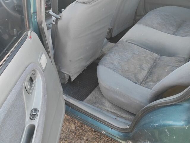 Зелений Деу Нексія, об'ємом двигуна 0 л та пробігом 200 тис. км за 800 $, фото 10 на Automoto.ua