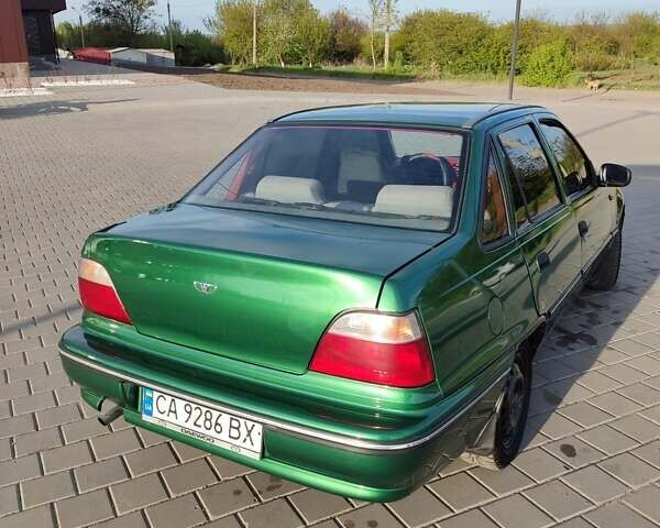 Зеленый Дэу Нексия, объемом двигателя 1.5 л и пробегом 300 тыс. км за 999 $, фото 7 на Automoto.ua