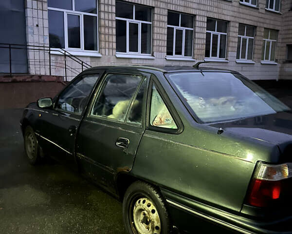 Зеленый Дэу Нексия, объемом двигателя 1.5 л и пробегом 169 тыс. км за 900 $, фото 3 на Automoto.ua