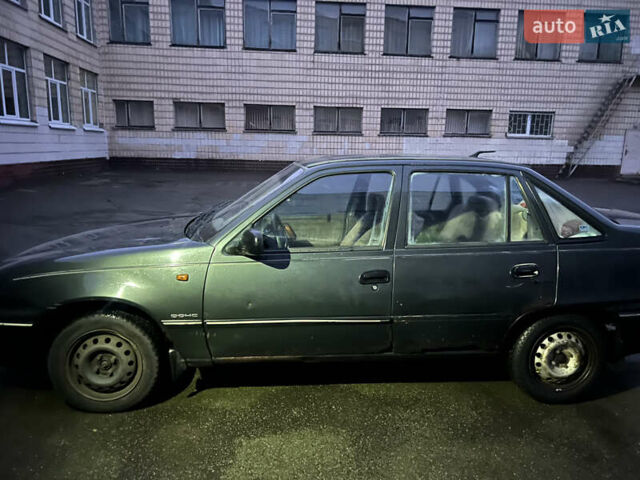 Зеленый Дэу Нексия, объемом двигателя 1.5 л и пробегом 169 тыс. км за 900 $, фото 2 на Automoto.ua