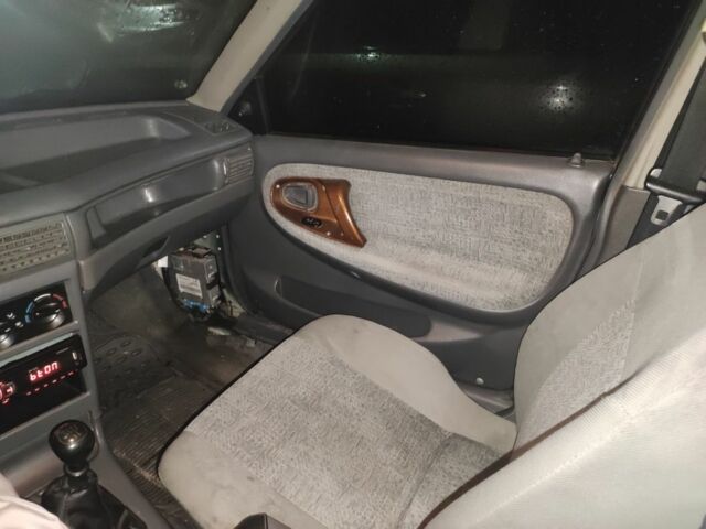 Зеленый Дэу Нексия, объемом двигателя 1.5 л и пробегом 291 тыс. км за 1300 $, фото 6 на Automoto.ua