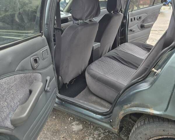 Дэу Нексия 2005 в Киеве на Automoto.ua Зеленый Дэу Нексия, объемом двигателя 1.5 л и пробегом 294 тыс. км за 1500 $, фото 10 на Automoto.ua