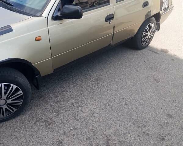 Зелений Деу Нексія, об'ємом двигуна 1.5 л та пробігом 343 тис. км за 1250 $, фото 8 на Automoto.ua