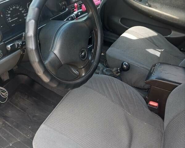 Зелений Деу Нексія, об'ємом двигуна 1.5 л та пробігом 343 тис. км за 1250 $, фото 4 на Automoto.ua