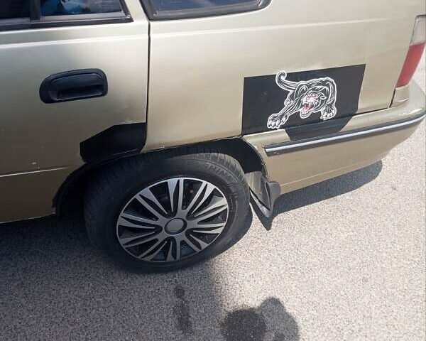 Зелений Деу Нексія, об'ємом двигуна 1.5 л та пробігом 343 тис. км за 1250 $, фото 7 на Automoto.ua