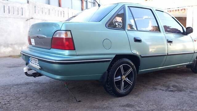 Зеленый Дэу Нексия, объемом двигателя 1.6 л и пробегом 280 тыс. км за 1950 $, фото 8 на Automoto.ua