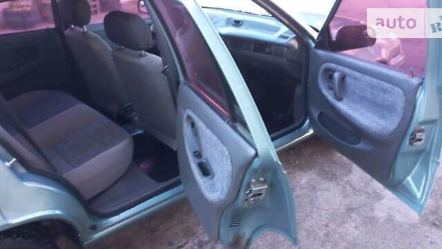 Зеленый Дэу Нексия, объемом двигателя 1.6 л и пробегом 280 тыс. км за 1950 $, фото 14 на Automoto.ua