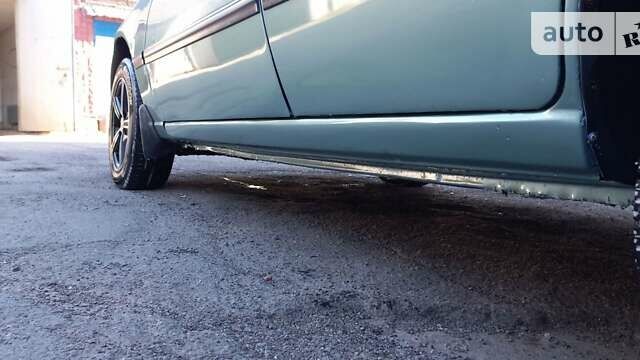 Зеленый Дэу Нексия, объемом двигателя 1.6 л и пробегом 280 тыс. км за 1950 $, фото 5 на Automoto.ua