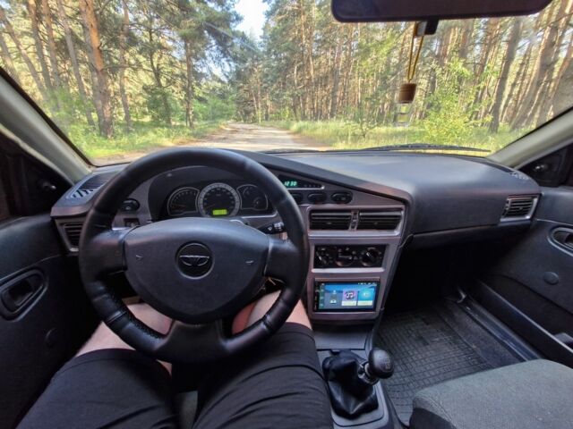 Зелений Деу Нексія, об'ємом двигуна 1.6 л та пробігом 218 тис. км за 2400 $, фото 6 на Automoto.ua