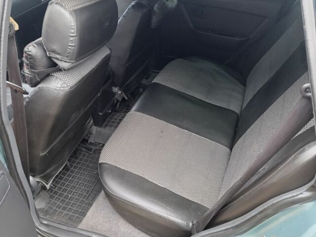 Зеленый Дэу Нексия, объемом двигателя 1.5 л и пробегом 160 тыс. км за 3000 $, фото 7 на Automoto.ua