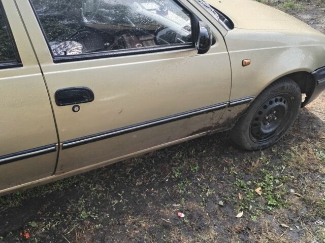 Зелений Деу Нексія, об'ємом двигуна 1 л та пробігом 300 тис. км за 1500 $, фото 2 на Automoto.ua