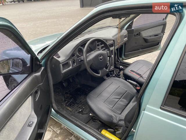 Зеленый Дэу Нексия, объемом двигателя 1.6 л и пробегом 128 тыс. км за 2700 $, фото 11 на Automoto.ua