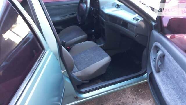 Зеленый Дэу Нексия, объемом двигателя 1.6 л и пробегом 280 тыс. км за 1950 $, фото 13 на Automoto.ua