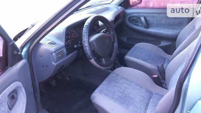 Зеленый Дэу Нексия, объемом двигателя 1.6 л и пробегом 280 тыс. км за 1950 $, фото 17 на Automoto.ua