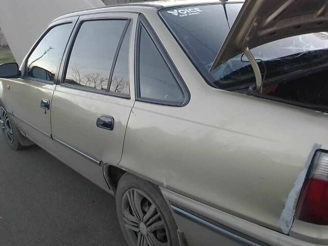 Помаранчевий Деу Нексія, об'ємом двигуна 1.5 л та пробігом 187 тис. км за 1800 $, фото 4 на Automoto.ua