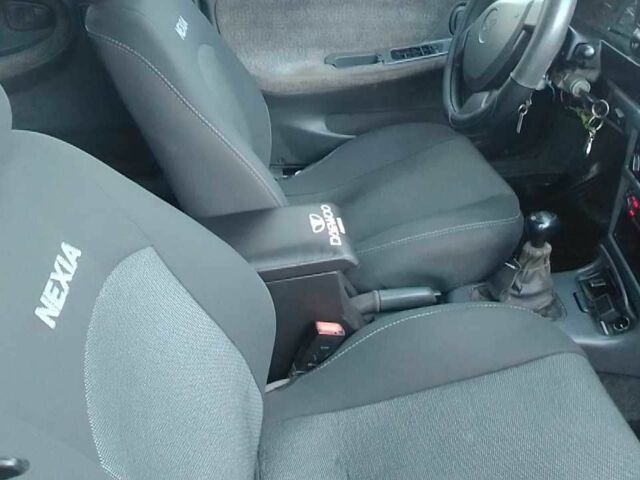 Помаранчевий Деу Нексія, об'ємом двигуна 1.5 л та пробігом 187 тис. км за 1800 $, фото 8 на Automoto.ua