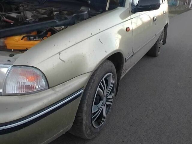 Помаранчевий Деу Нексія, об'ємом двигуна 1.5 л та пробігом 187 тис. км за 1800 $, фото 1 на Automoto.ua