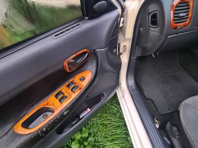 Белый Дэу Нубира, объемом двигателя 0 л и пробегом 75 тыс. км за 500 $, фото 3 на Automoto.ua