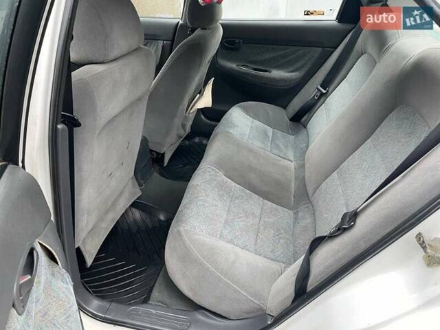 Белый Дэу Нубира, объемом двигателя 1.6 л и пробегом 250 тыс. км за 1500 $, фото 18 на Automoto.ua