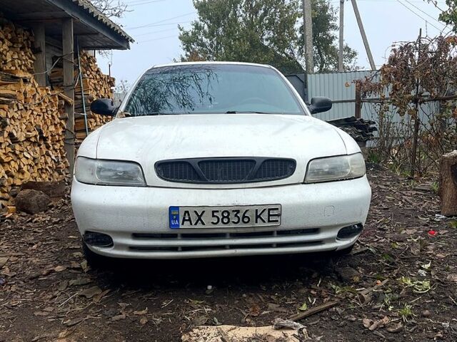 Білий Деу Нубіра, об'ємом двигуна 1.6 л та пробігом 301 тис. км за 1500 $, фото 6 на Automoto.ua
