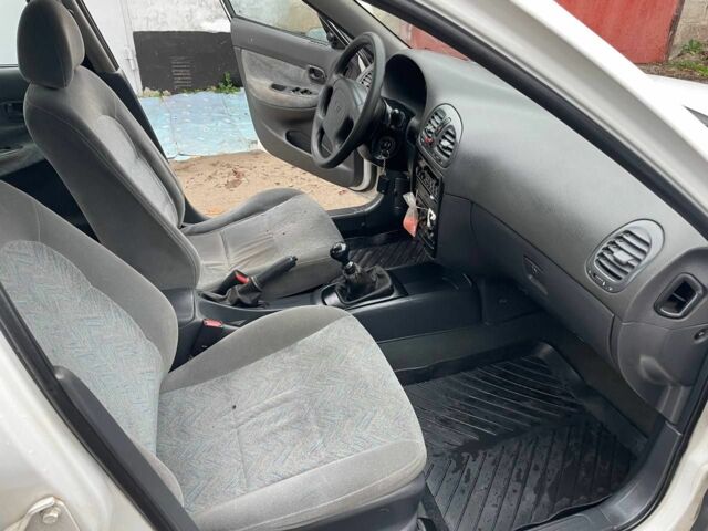 Білий Деу Нубіра, об'ємом двигуна 1.6 л та пробігом 250 тис. км за 1500 $, фото 14 на Automoto.ua