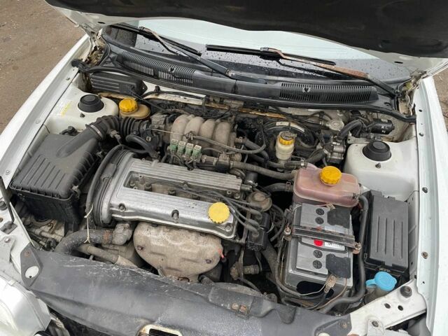 Білий Деу Нубіра, об'ємом двигуна 1.6 л та пробігом 250 тис. км за 1500 $, фото 20 на Automoto.ua