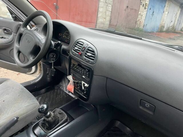 Білий Деу Нубіра, об'ємом двигуна 1.6 л та пробігом 250 тис. км за 1500 $, фото 13 на Automoto.ua