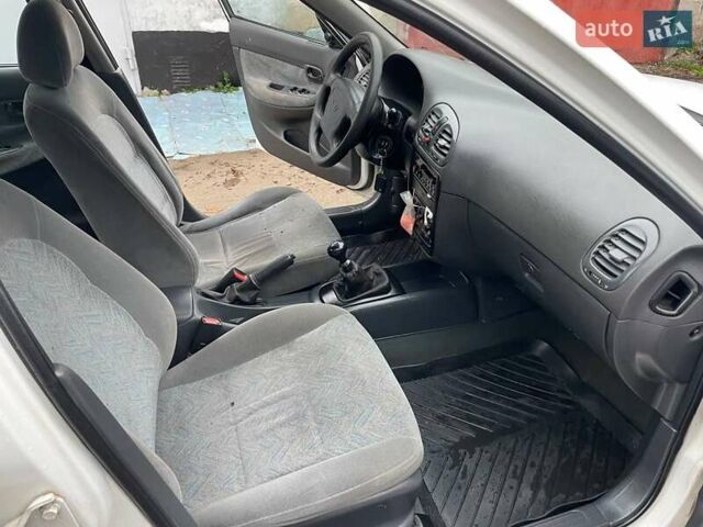 Белый Дэу Нубира, объемом двигателя 1.6 л и пробегом 250 тыс. км за 1500 $, фото 13 на Automoto.ua