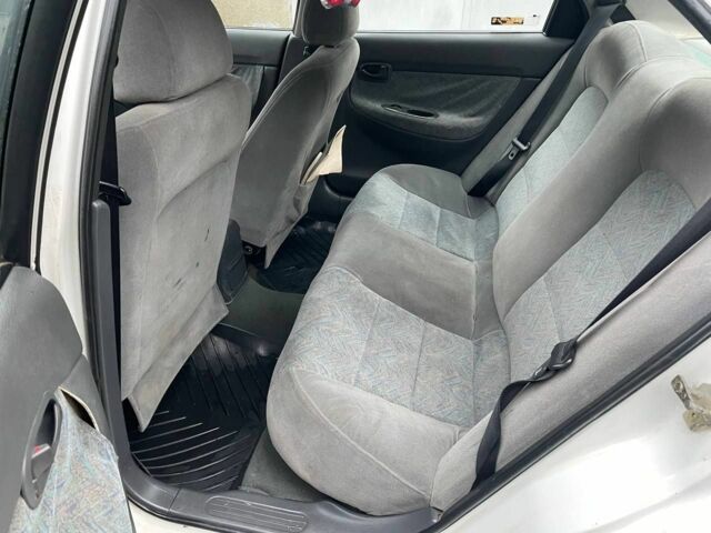 Білий Деу Нубіра, об'ємом двигуна 1.6 л та пробігом 250 тис. км за 1500 $, фото 18 на Automoto.ua