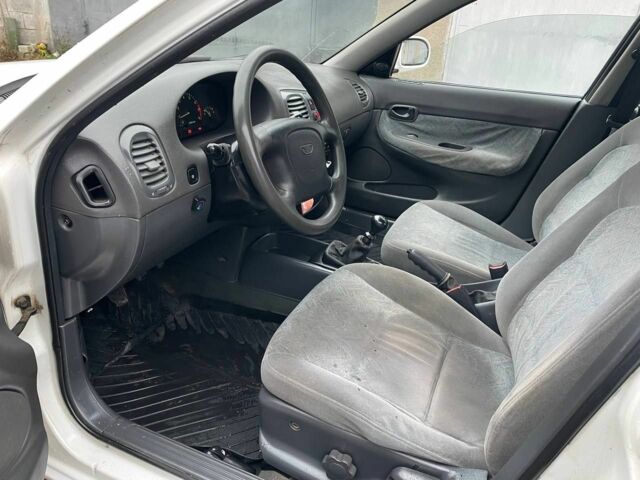 Білий Деу Нубіра, об'ємом двигуна 1.6 л та пробігом 250 тис. км за 1500 $, фото 10 на Automoto.ua