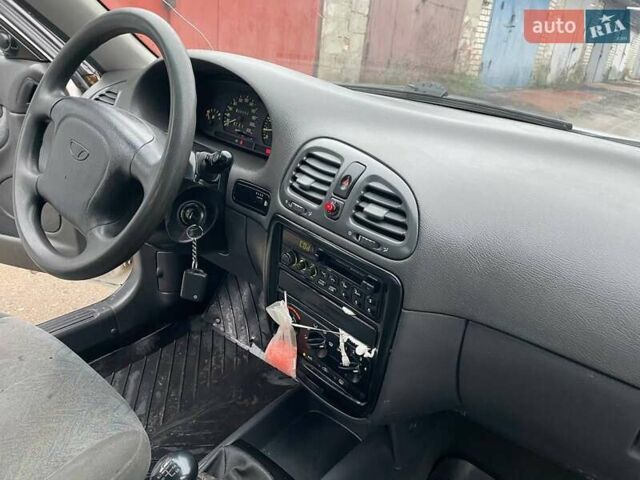 Белый Дэу Нубира, объемом двигателя 1.6 л и пробегом 250 тыс. км за 1500 $, фото 19 на Automoto.ua