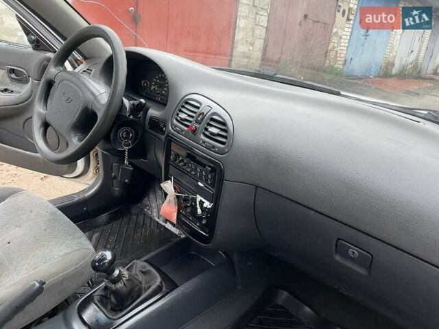 Белый Дэу Нубира, объемом двигателя 1.6 л и пробегом 250 тыс. км за 1500 $, фото 14 на Automoto.ua