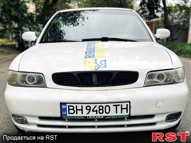 Белый Дэу Нубира, объемом двигателя 2 л и пробегом 150 тыс. км за 850 $, фото 1 на Automoto.ua