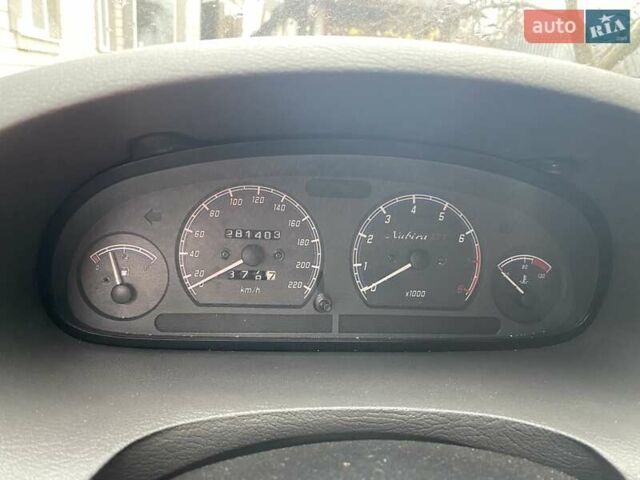 Белый Дэу Нубира, объемом двигателя 1.6 л и пробегом 281 тыс. км за 1600 $, фото 1 на Automoto.ua