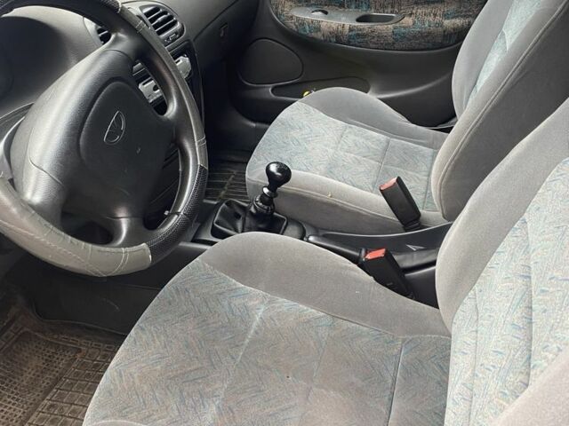 Белый Дэу Нубира, объемом двигателя 1.6 л и пробегом 281 тыс. км за 1600 $, фото 4 на Automoto.ua