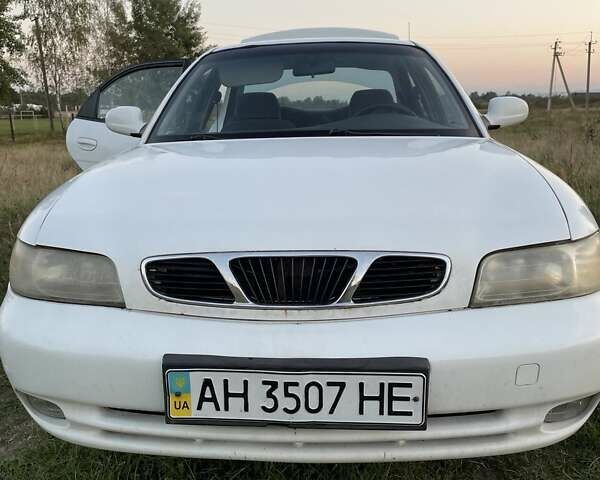 Білий Деу Нубіра, об'ємом двигуна 1.6 л та пробігом 235 тис. км за 1900 $, фото 2 на Automoto.ua