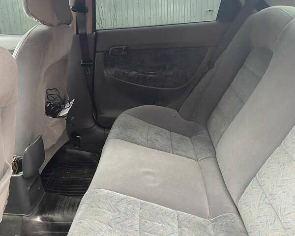 Белый Дэу Нубира, объемом двигателя 1.6 л и пробегом 281 тыс. км за 1600 $, фото 6 на Automoto.ua