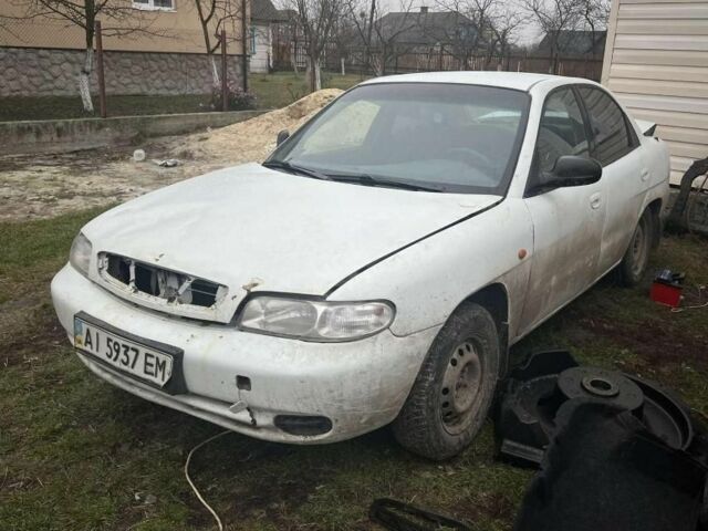 Белый Дэу Нубира, объемом двигателя 1.6 л и пробегом 340 тыс. км за 450 $, фото 4 на Automoto.ua