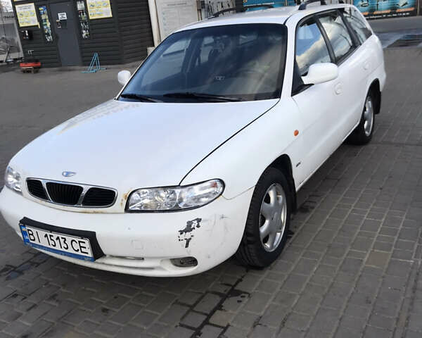 Білий Деу Нубіра, об'ємом двигуна 1.6 л та пробігом 206 тис. км за 2200 $, фото 4 на Automoto.ua