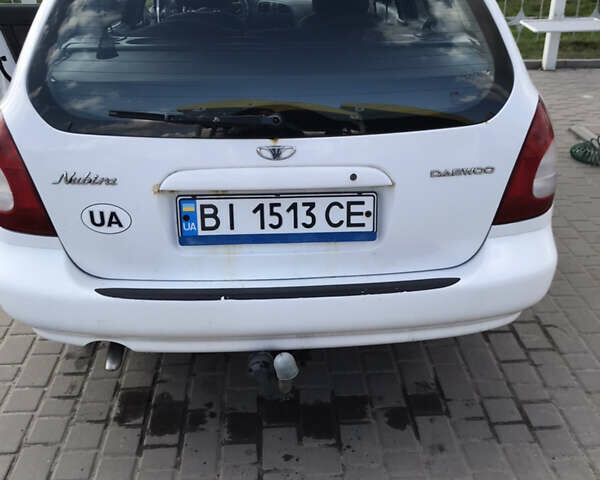 Білий Деу Нубіра, об'ємом двигуна 1.6 л та пробігом 206 тис. км за 2200 $, фото 7 на Automoto.ua