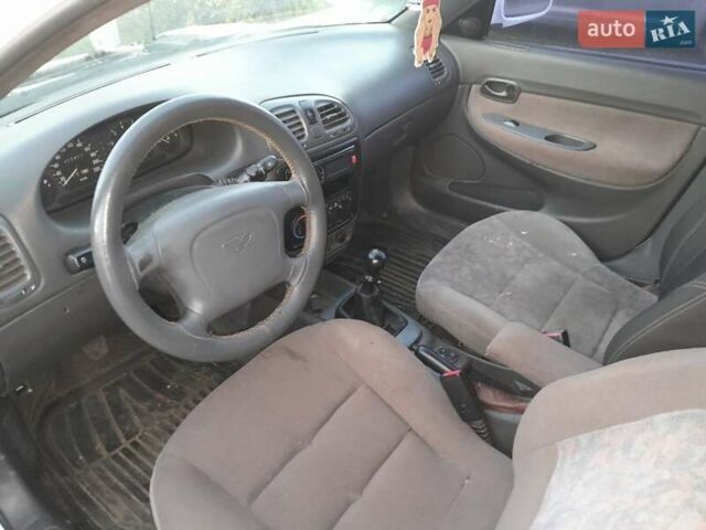 Білий Деу Нубіра, об'ємом двигуна 2 л та пробігом 300 тис. км за 1600 $, фото 3 на Automoto.ua