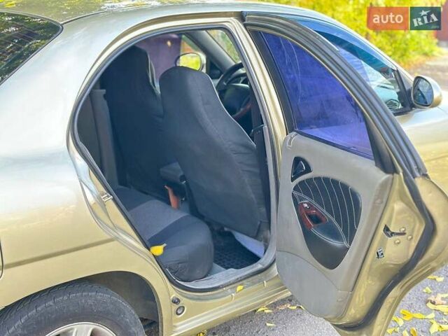 Бежевый Дэу Нубира, объемом двигателя 2 л и пробегом 220 тыс. км за 2200 $, фото 9 на Automoto.ua