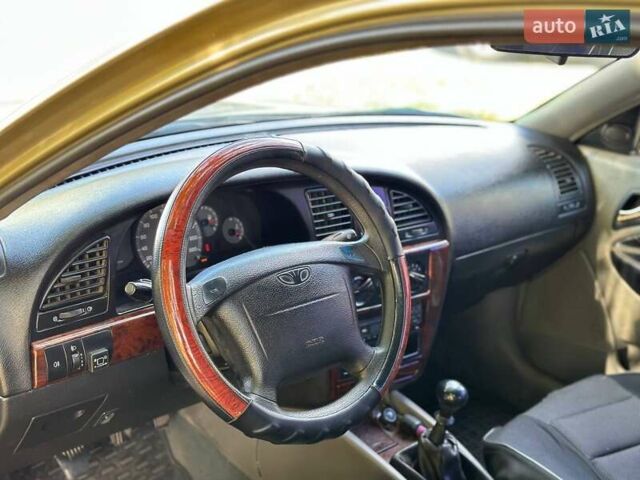 Бежевый Дэу Нубира, объемом двигателя 2 л и пробегом 220 тыс. км за 2200 $, фото 6 на Automoto.ua